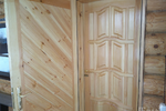 двойная деревянная дверь в баню